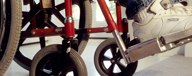 A child with cerebral palsy in a wheelchair. 