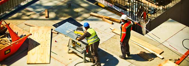 2 men at a construction site